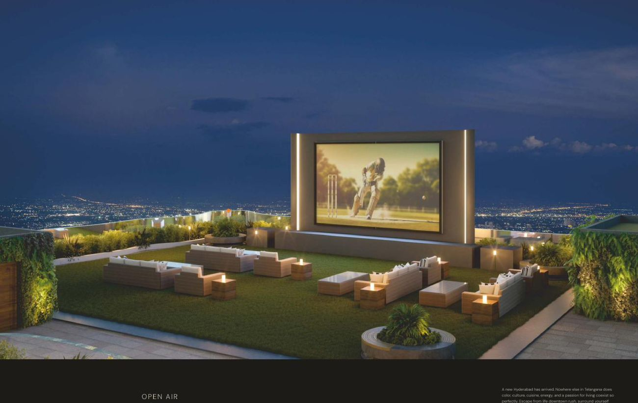Open-air terrace theatre with city lights at The Twins