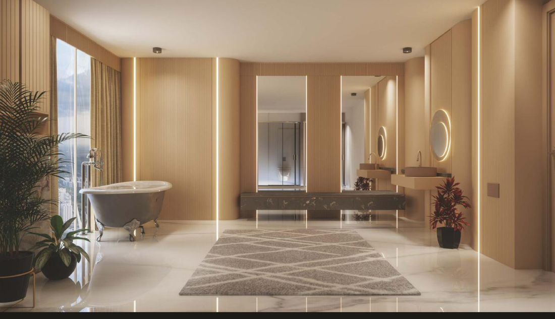 Oversized spa-like master bathroom with imported marble at The Twins